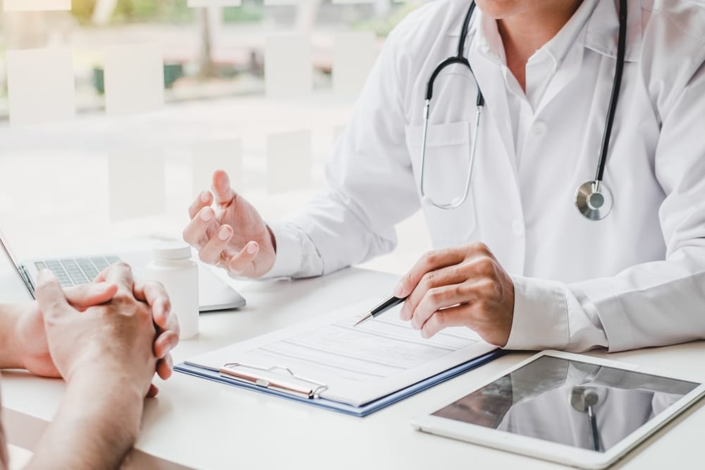 Doctor conducting mandatory Work Permit medical examination at Mediway Medical Centre Singapore